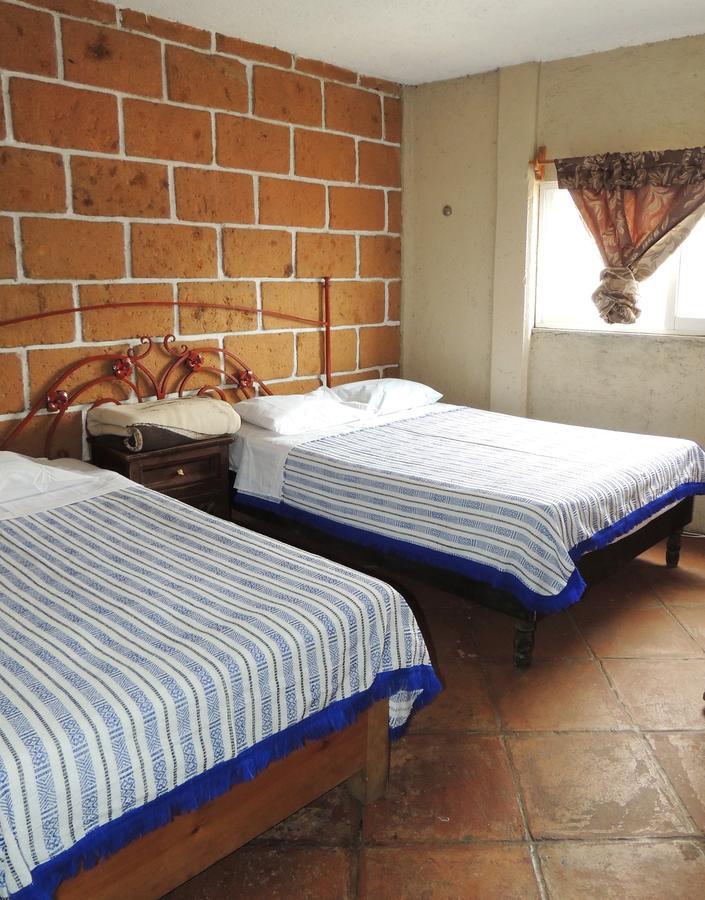 Hotel Las Fumarolas De Don Goyo Чолула Экстерьер фото